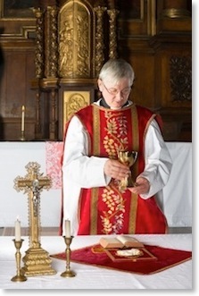 priest with wine